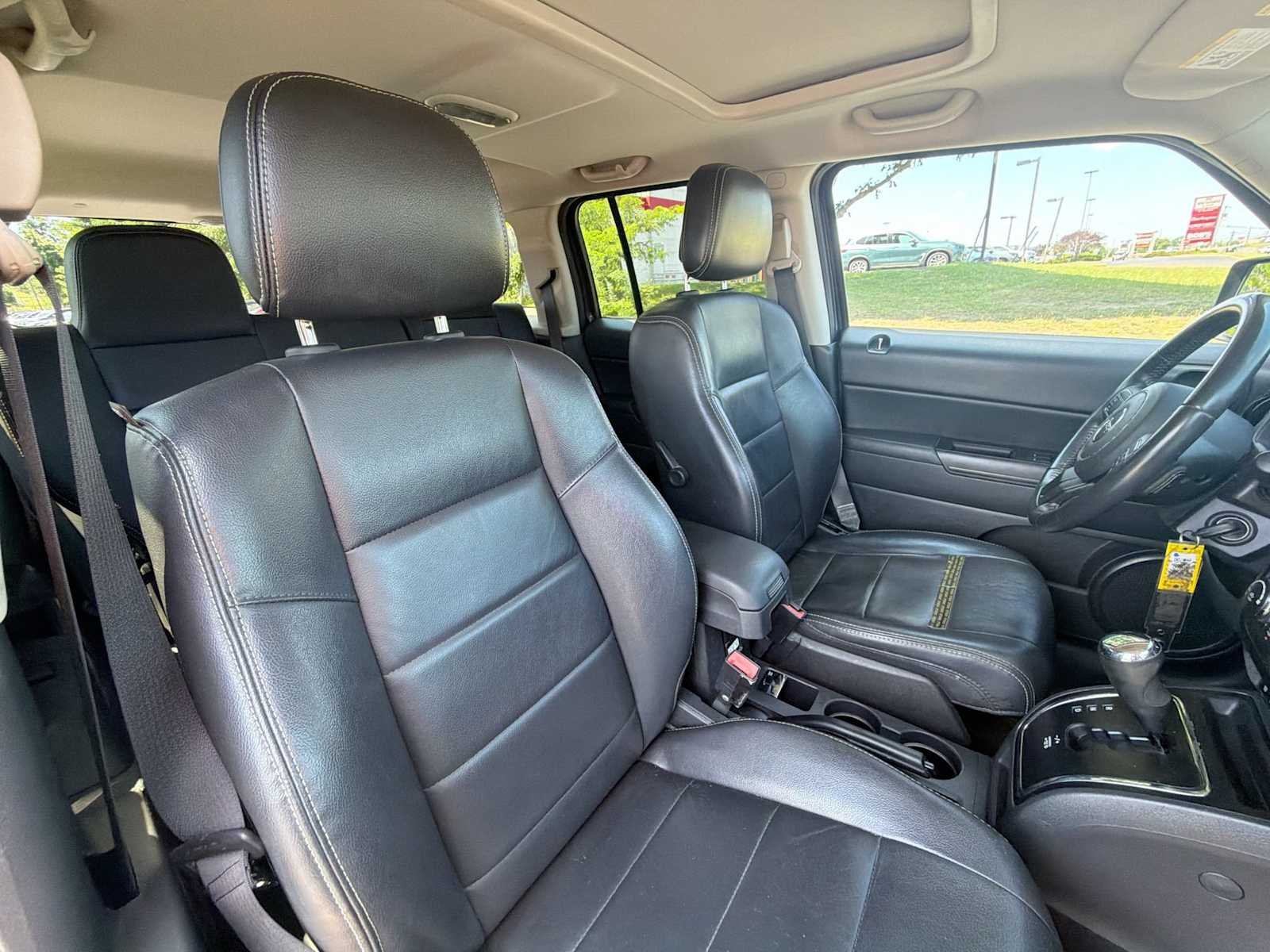 Used 2016 Granite Crystal Metallic Clearcoat Jeep High Altitude Edition image 17