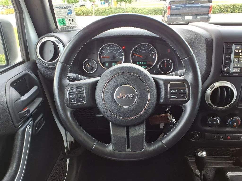 Used 2016 White Jeep Unlimited Sahara image 20