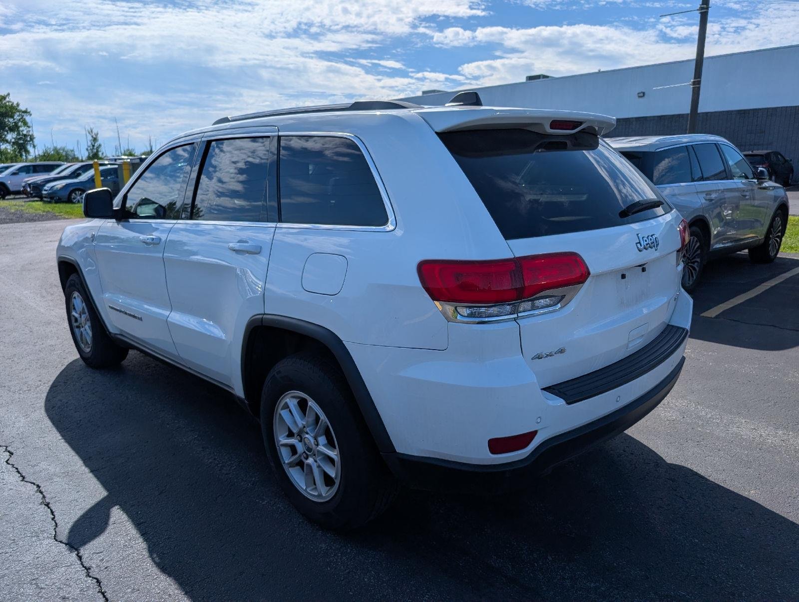 Used 2019 Bright White Clearcoat Jeep Laredo E image 5