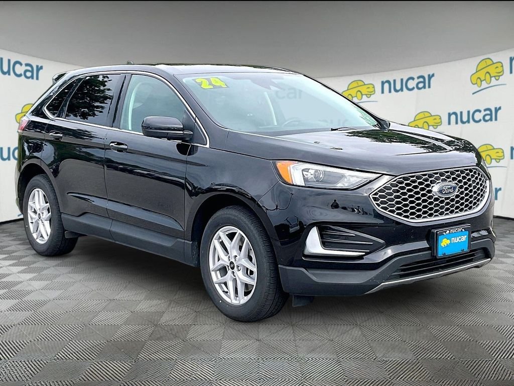 Used 2024 Agate Black Metallic Ford SEL image 1