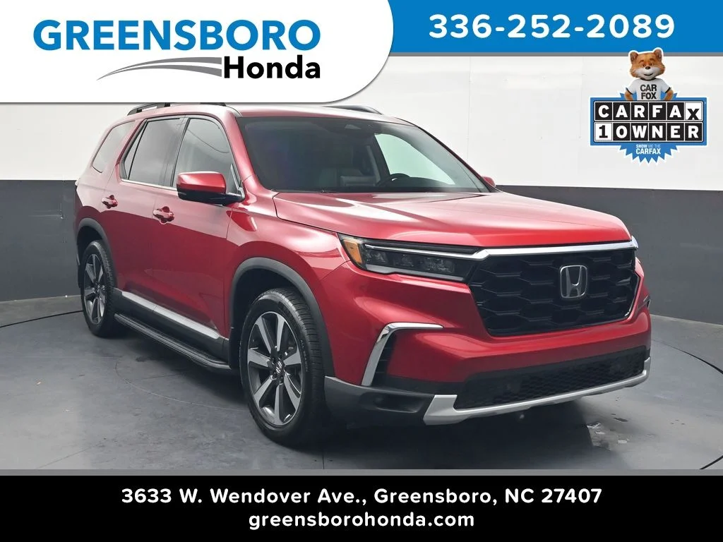 Used 2024 Radiant Red Metallic II Honda Touring image 1