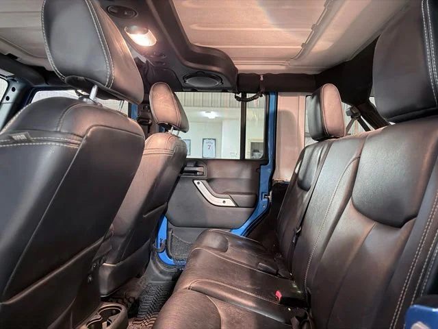 Used 2014 Blue Jeep Unlimited Sahara image 14