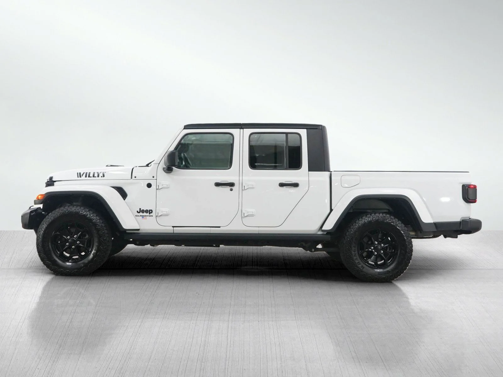 Used 2021 Jeep Gladiator WILLYS with VIN 1C6HJTAG6ML614804 for sale in Hopkins, Minnesota