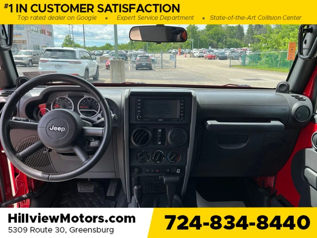 Used 2010 Flame Red Jeep Unlimited Rubicon image 16