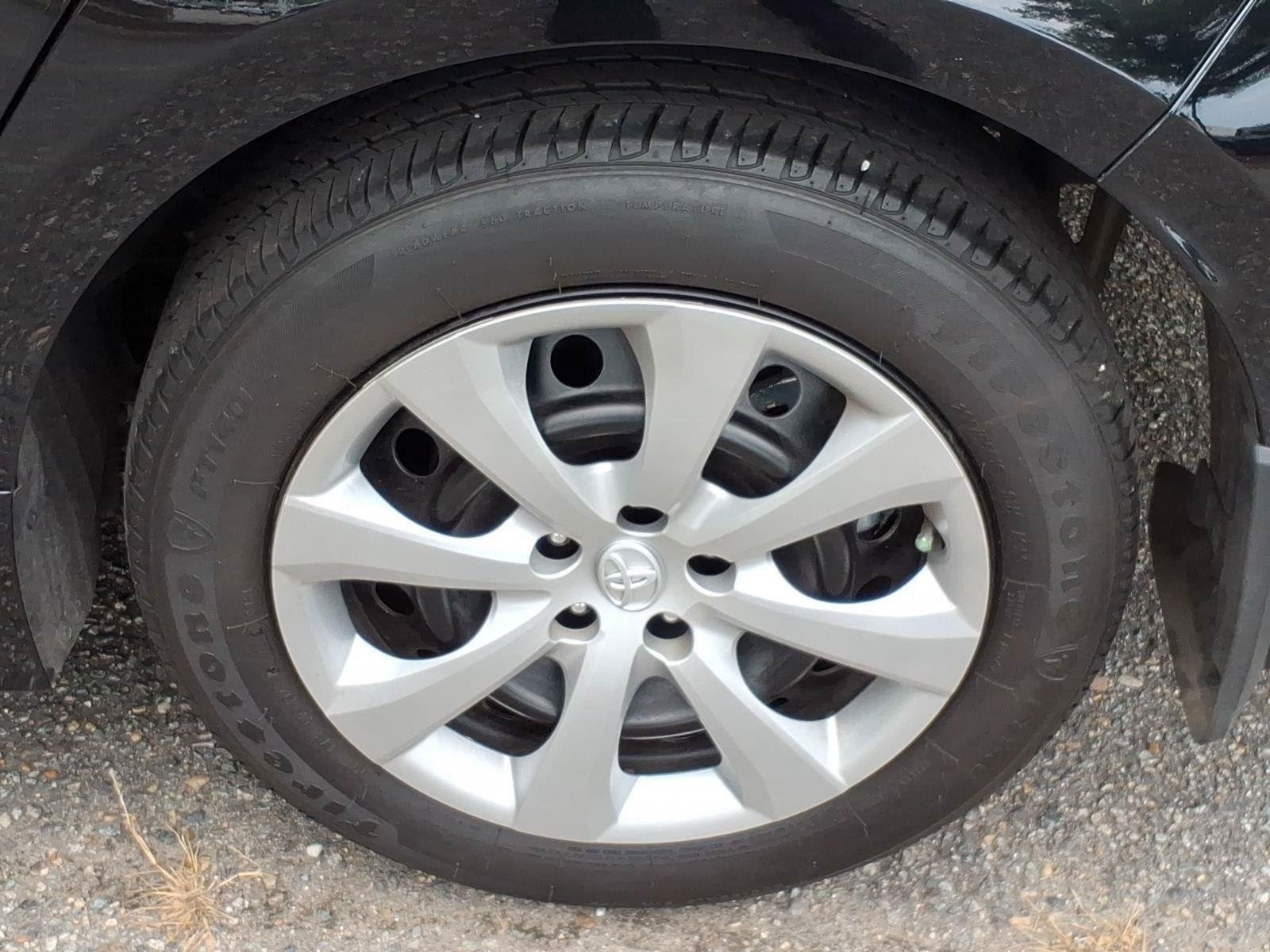 Used 2025 Midnight Black Metallic Toyota LE image 5