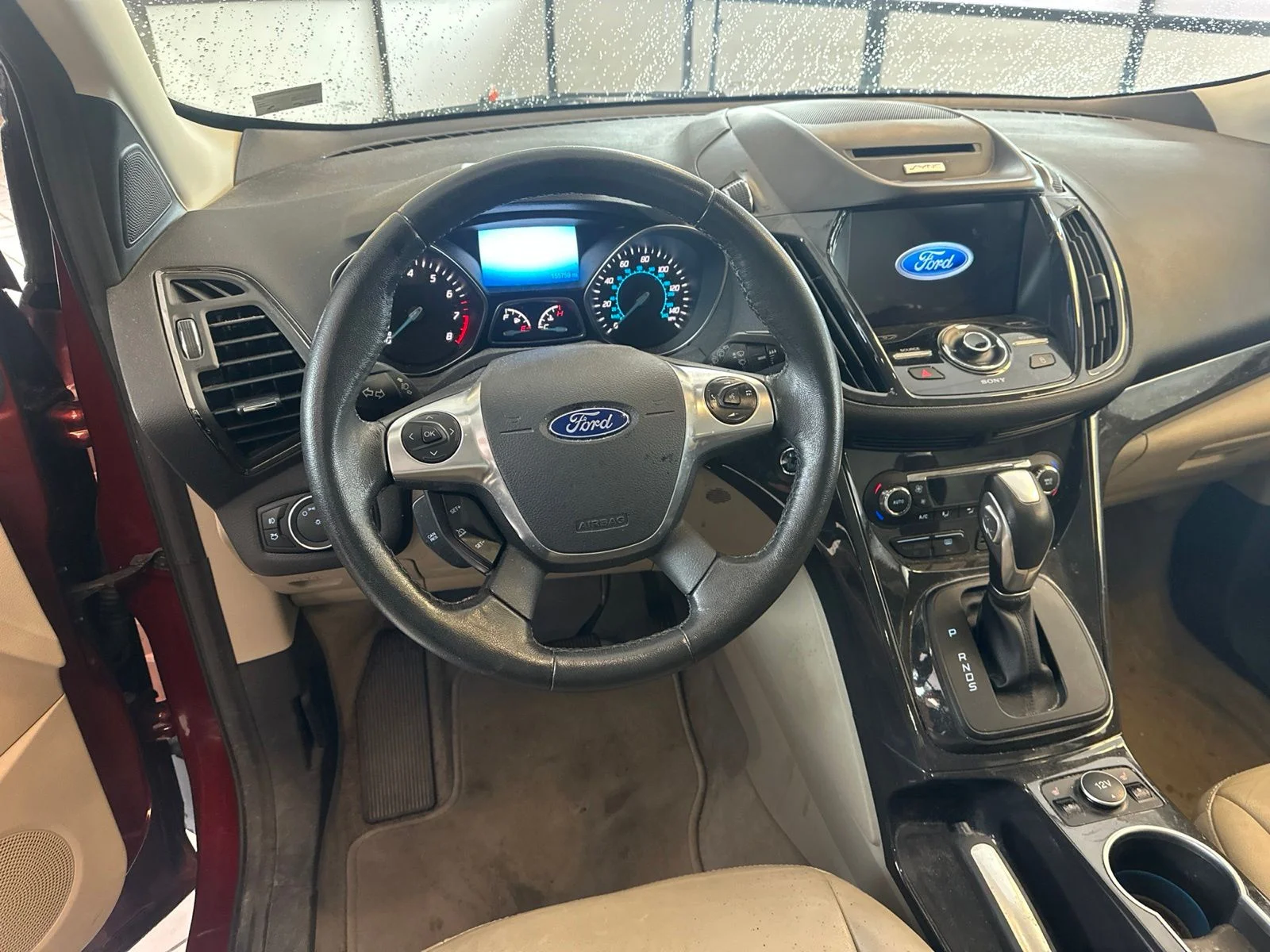 Used 2016 Orange Ford Titanium image 2