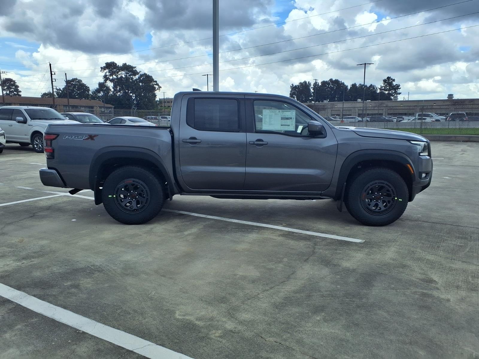 New 2026 Gun Metallic Nissan Crew Cab PRO-X® image 4