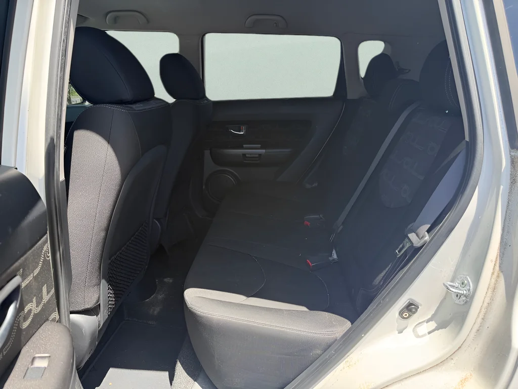 Used 2012 Clear White Kia Plus image 8