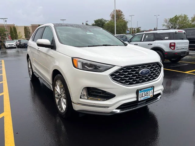Used 2024 White Ford Titanium image 1