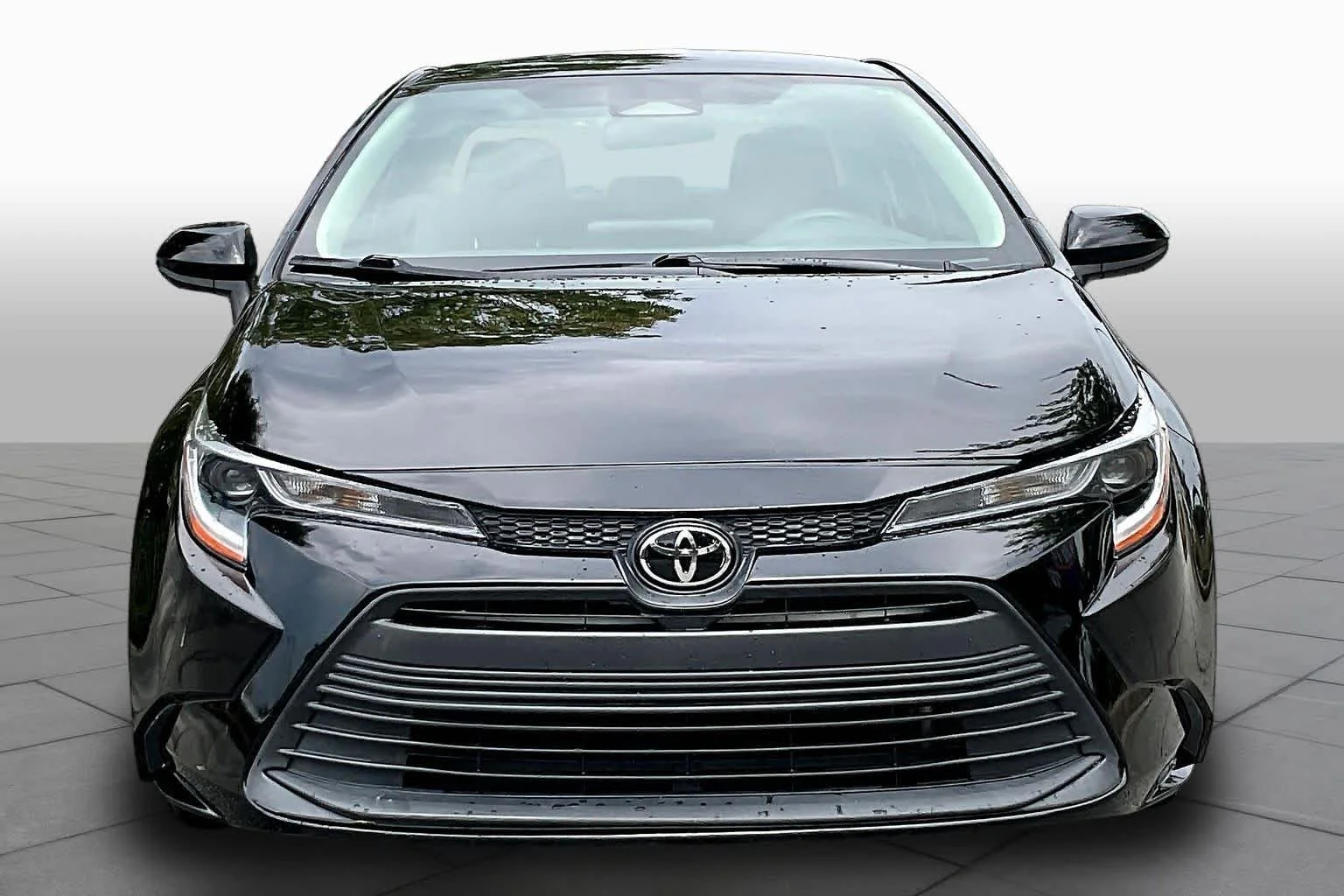 Used 2024 Midnight Black Metallic Toyota LE image 4