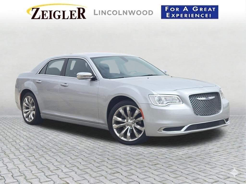 Used 2021 Silver Chrysler Touring image 1