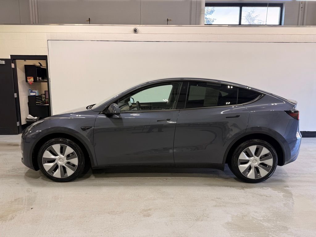 Used 2023 Tesla Model Y Long Range with VIN 7SAYGDEE5PA038507 for sale in Golden Valley, MN