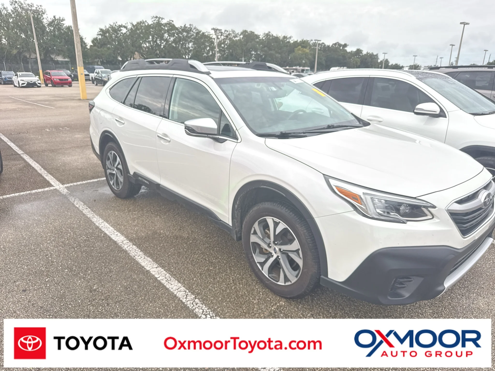 Used 2021 Crystal White Pearl Subaru Touring image 1