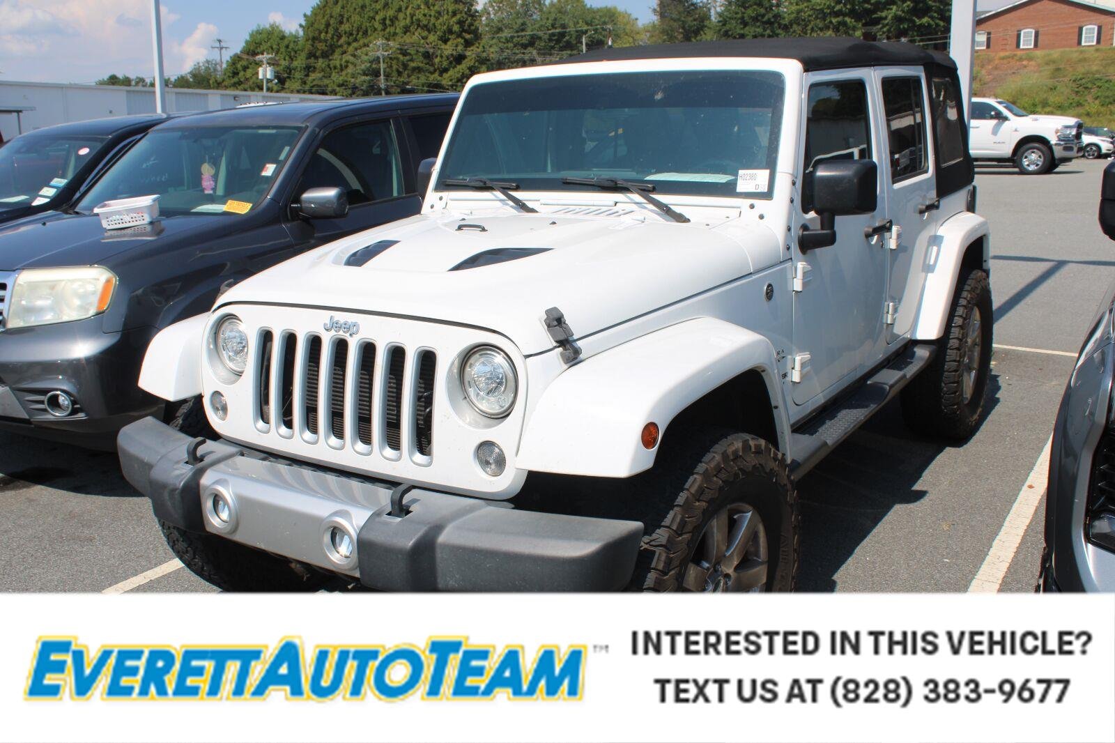 Used 2017 Bright White Clearcoat Jeep Sahara image 1