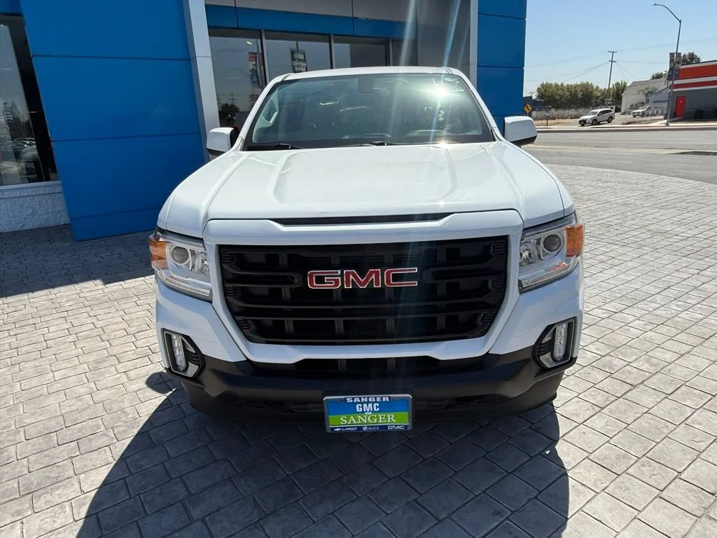 Used 2022 SUMMIT WHITE GMC 4WD Elevation image 3