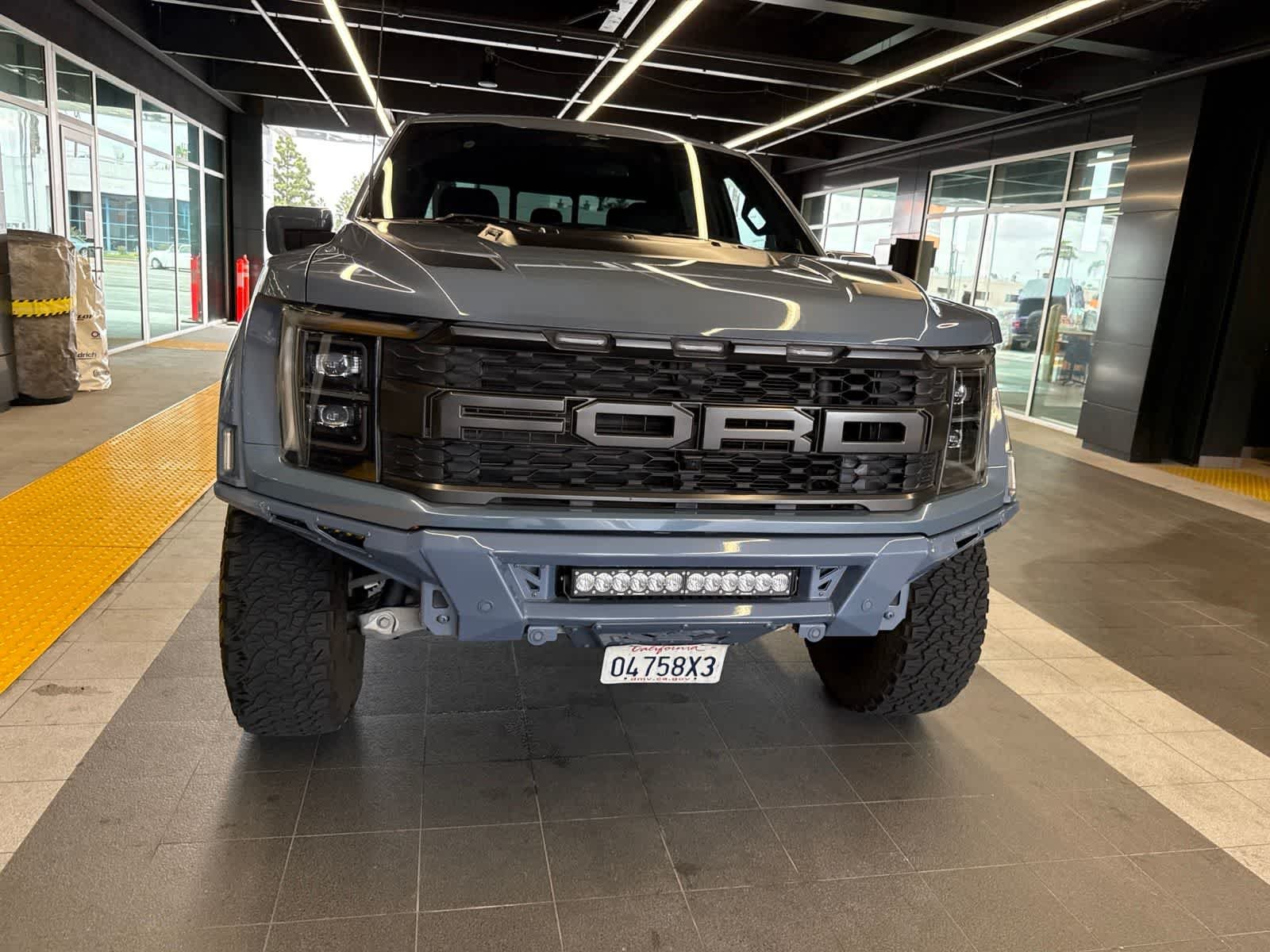 Used 2023 Azure Gray Metallic Tri-Coat Ford Raptor image 6