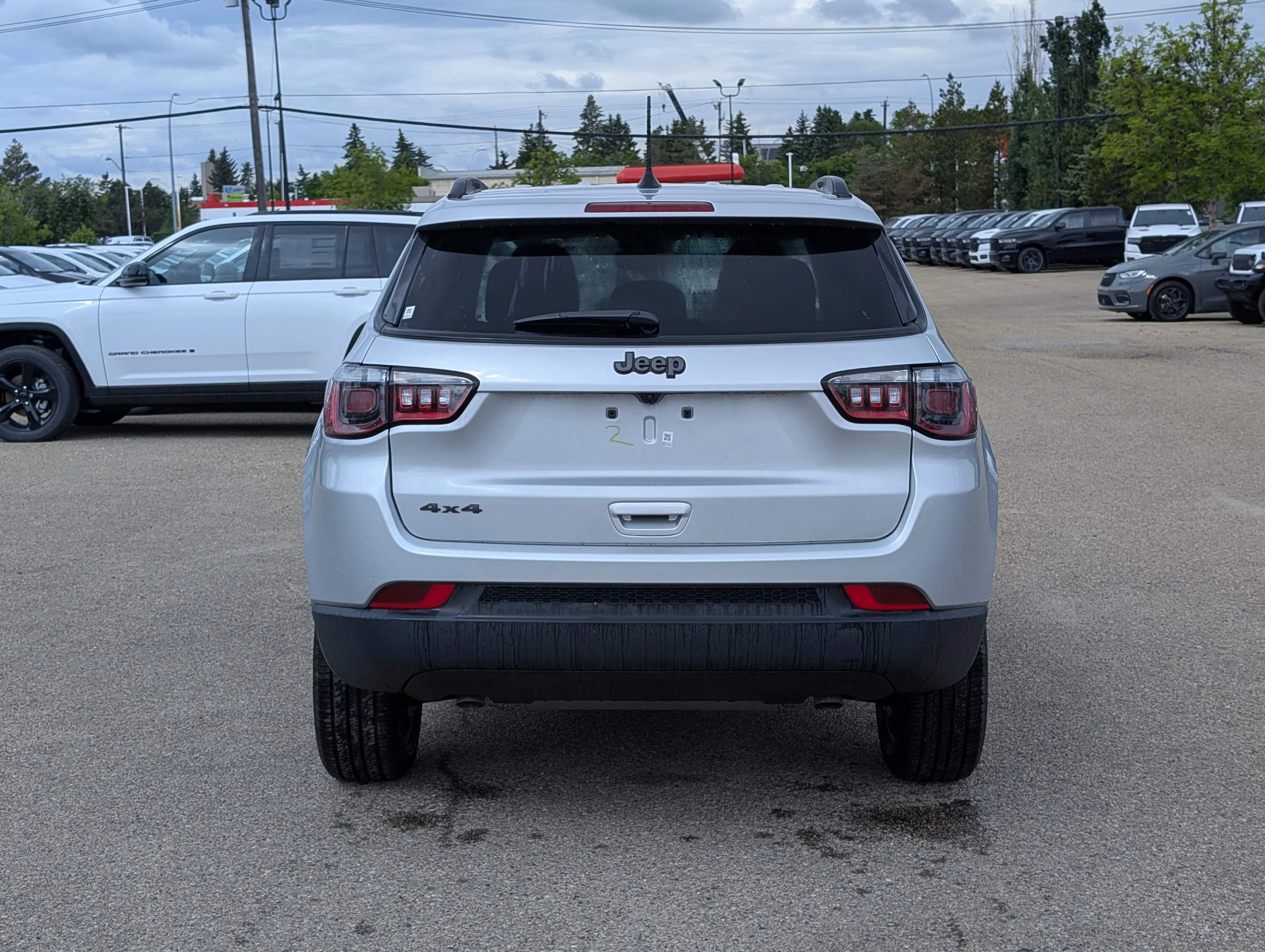 New 2026 Silver Zynith Metallic Jeep North image 5