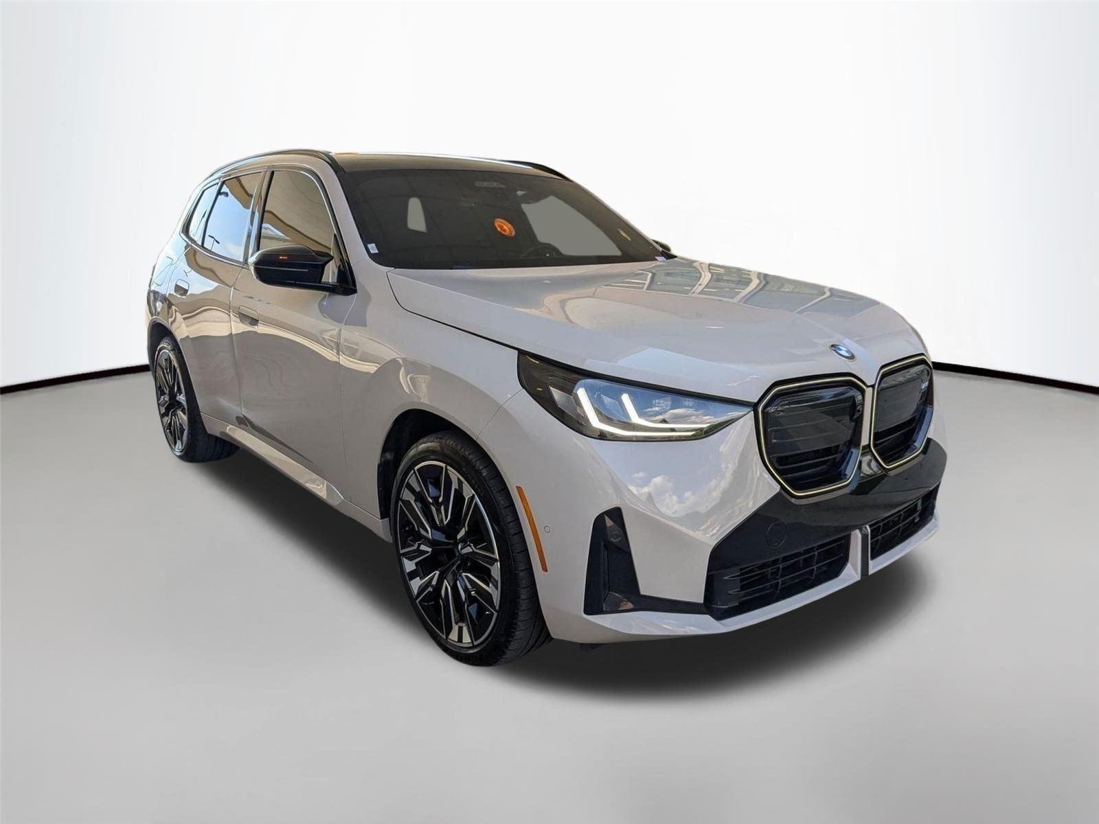 Used 2025 Dune Grey Metallic BMW M50 xDrive image 3