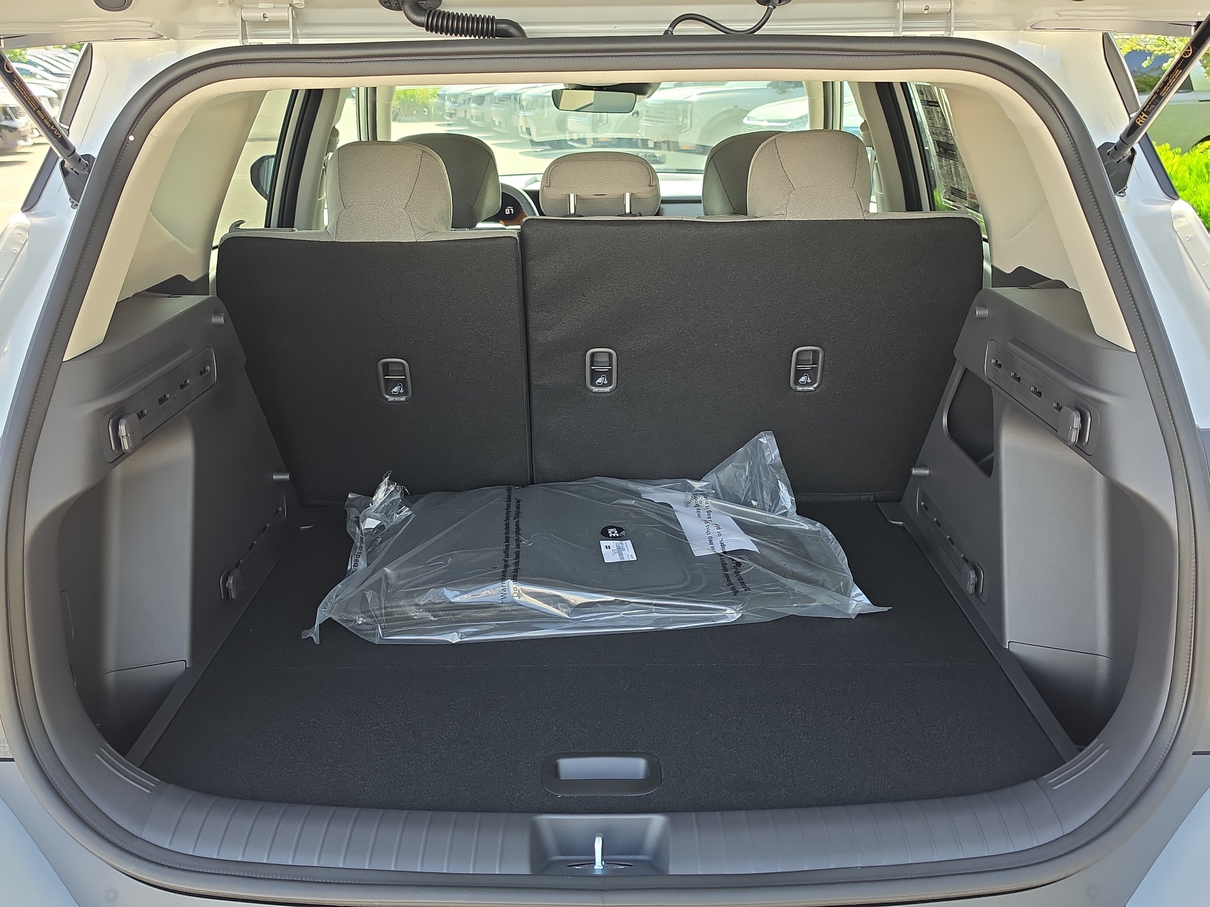 New 2027 Ivory Silver Kia LX image 10