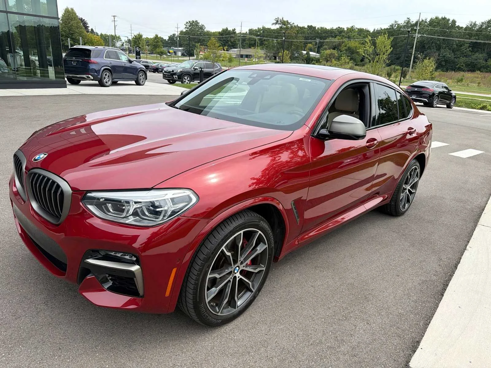 Used 2021 Flamenco Red Metallic BMW M40i image 1