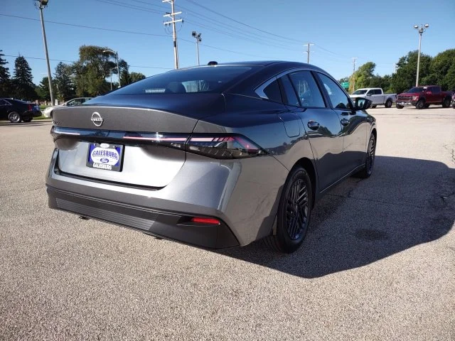 Used 2027 Gun Metallic Nissan SV image 6