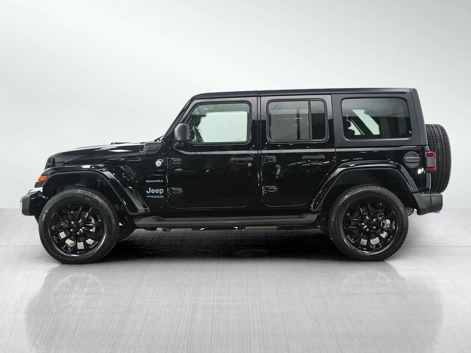 Used 2022 Jeep Wrangler Unlimited Sahara 4XE with VIN 1C4JJXP68NW275544 for sale in Minneapolis, Minnesota