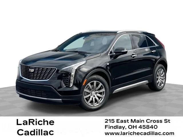 Used 2022 STELLAR BLACK METALLIC Cadillac AWD Premium Luxury image 1