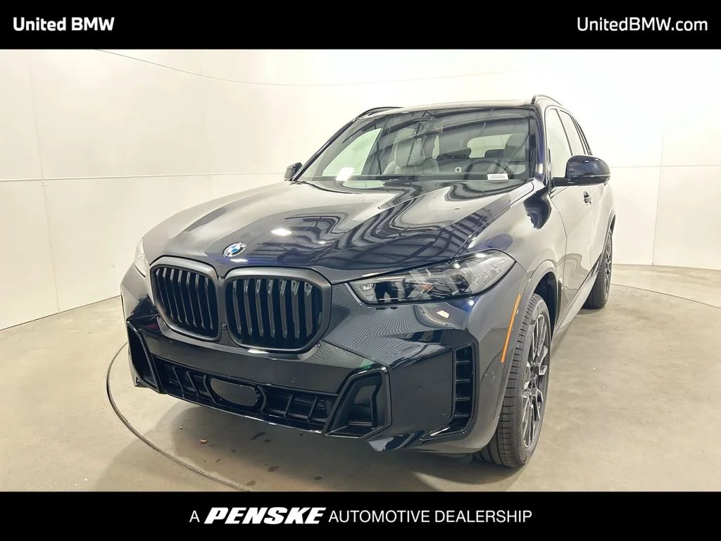 Used 2026 Carbon Black Metallic BMW sDrive40i image 1
