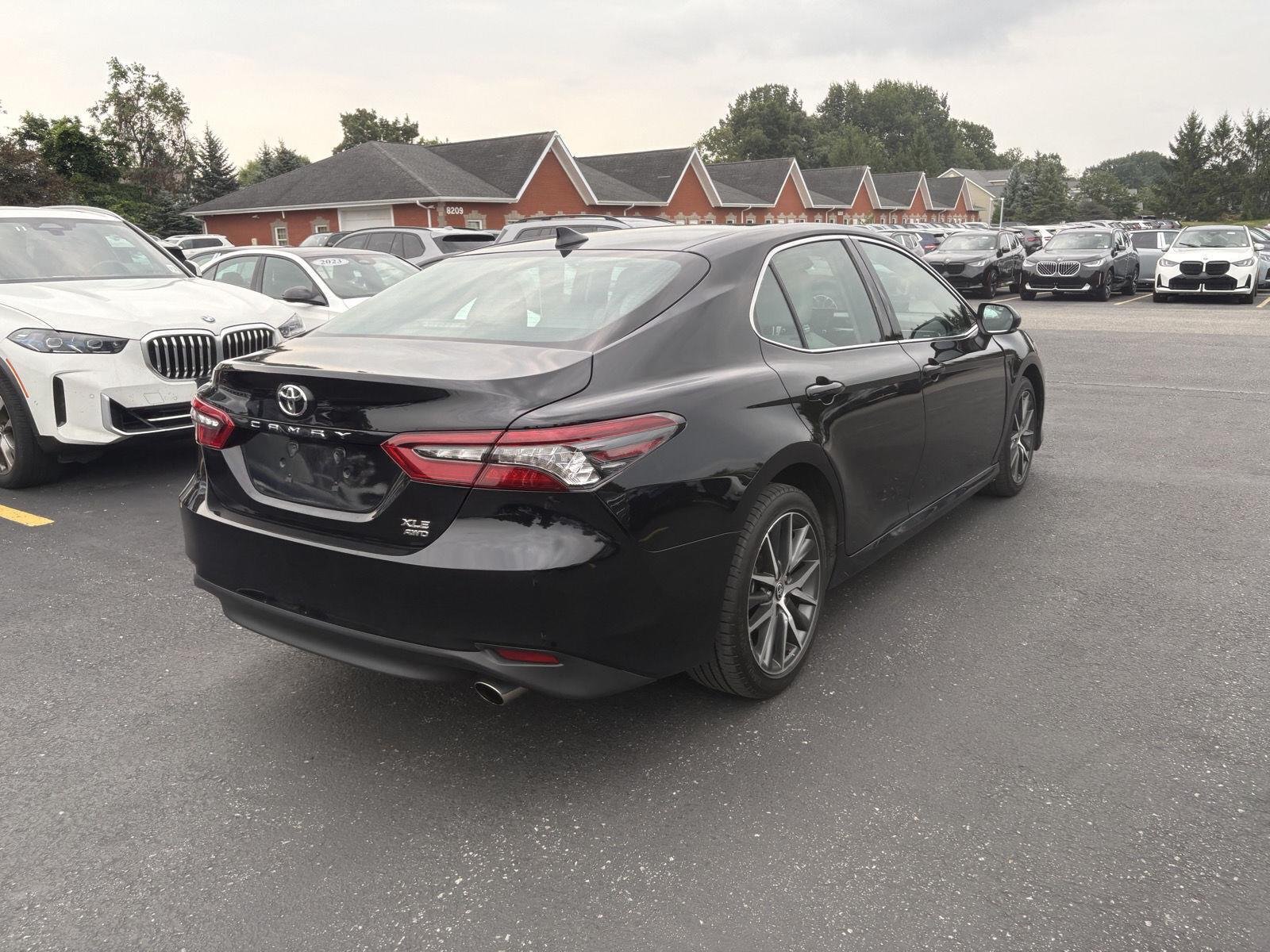 Used 2023 Midnight Black Metallic Toyota XLE image 7