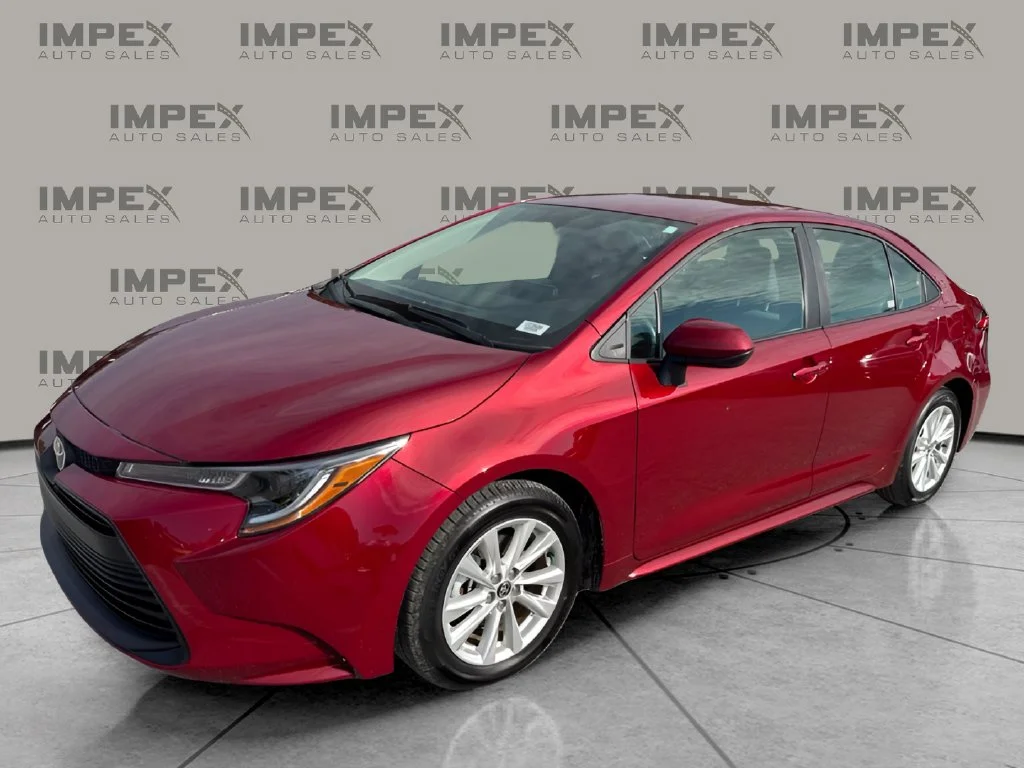 Used 2025 Red Toyota LE image 1