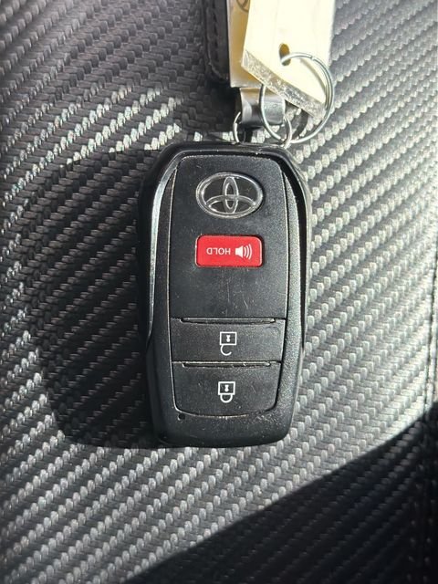 Used 2024 Barcelona Red Metallic Toyota LE image 27