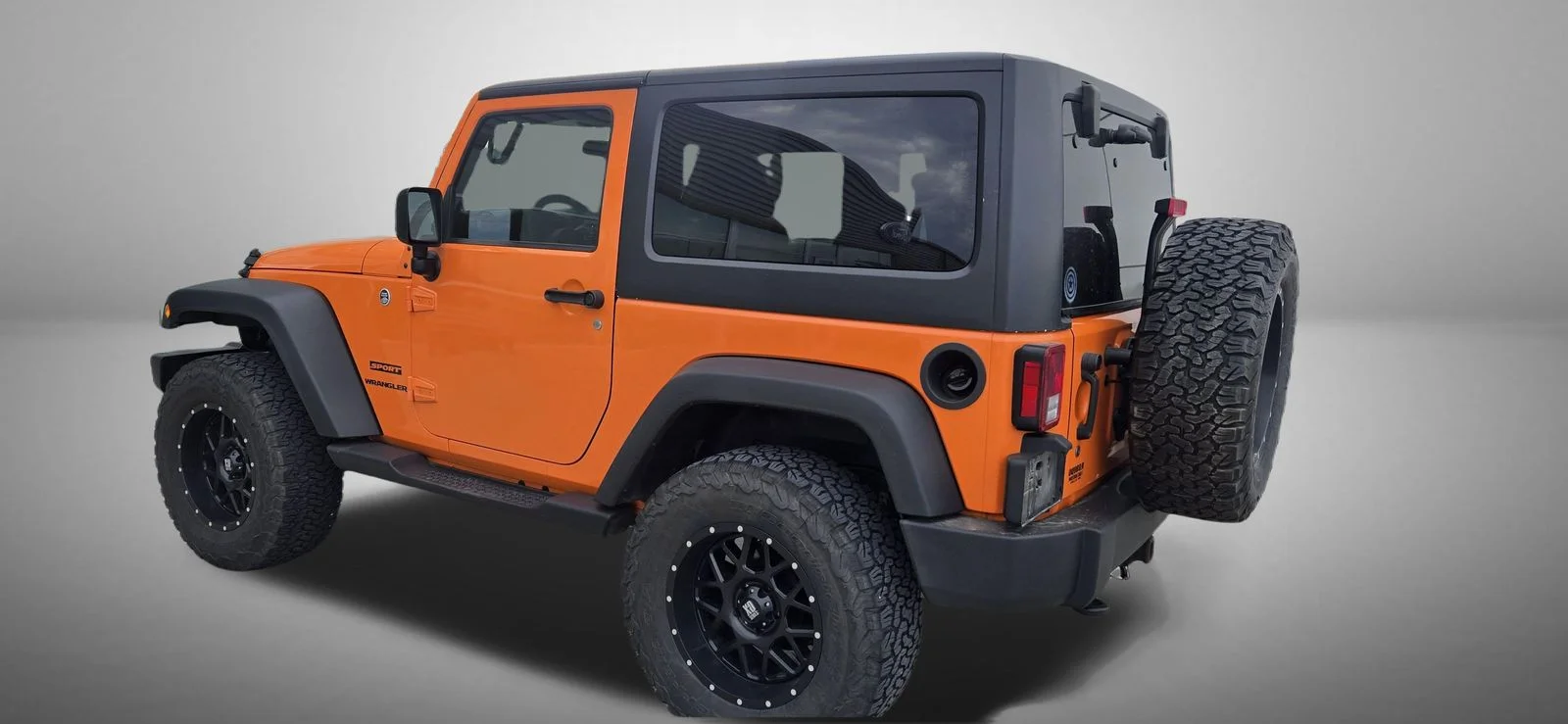 Used 2012 Orange Jeep Sport image 4