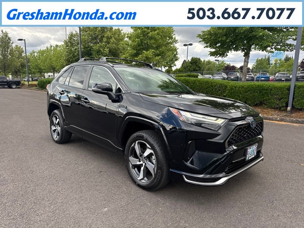 Used 2022 Midnight Black Metallic Toyota SE image 1