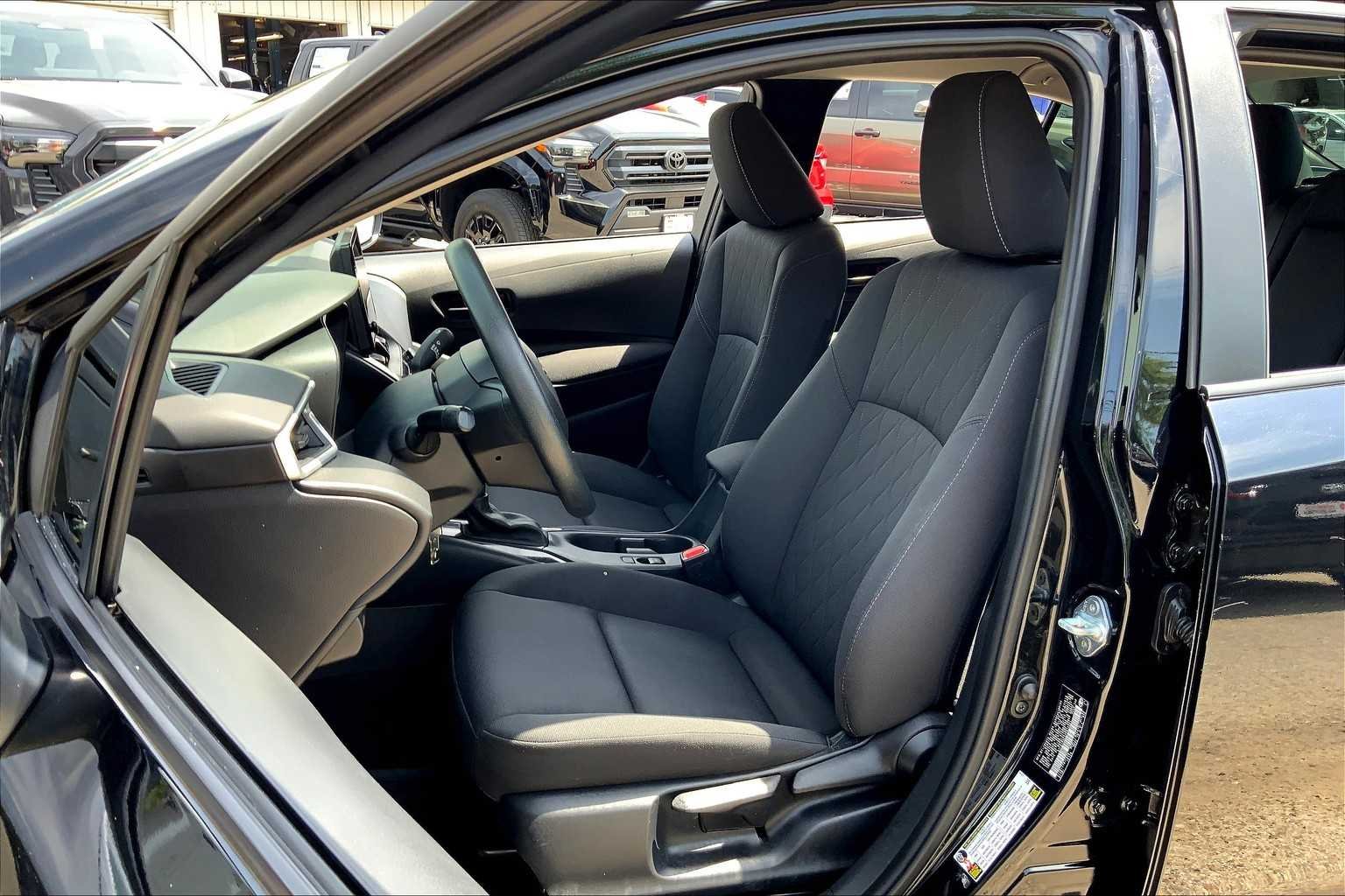 Used 2023 Midnight Black Metallic Toyota LE image 8