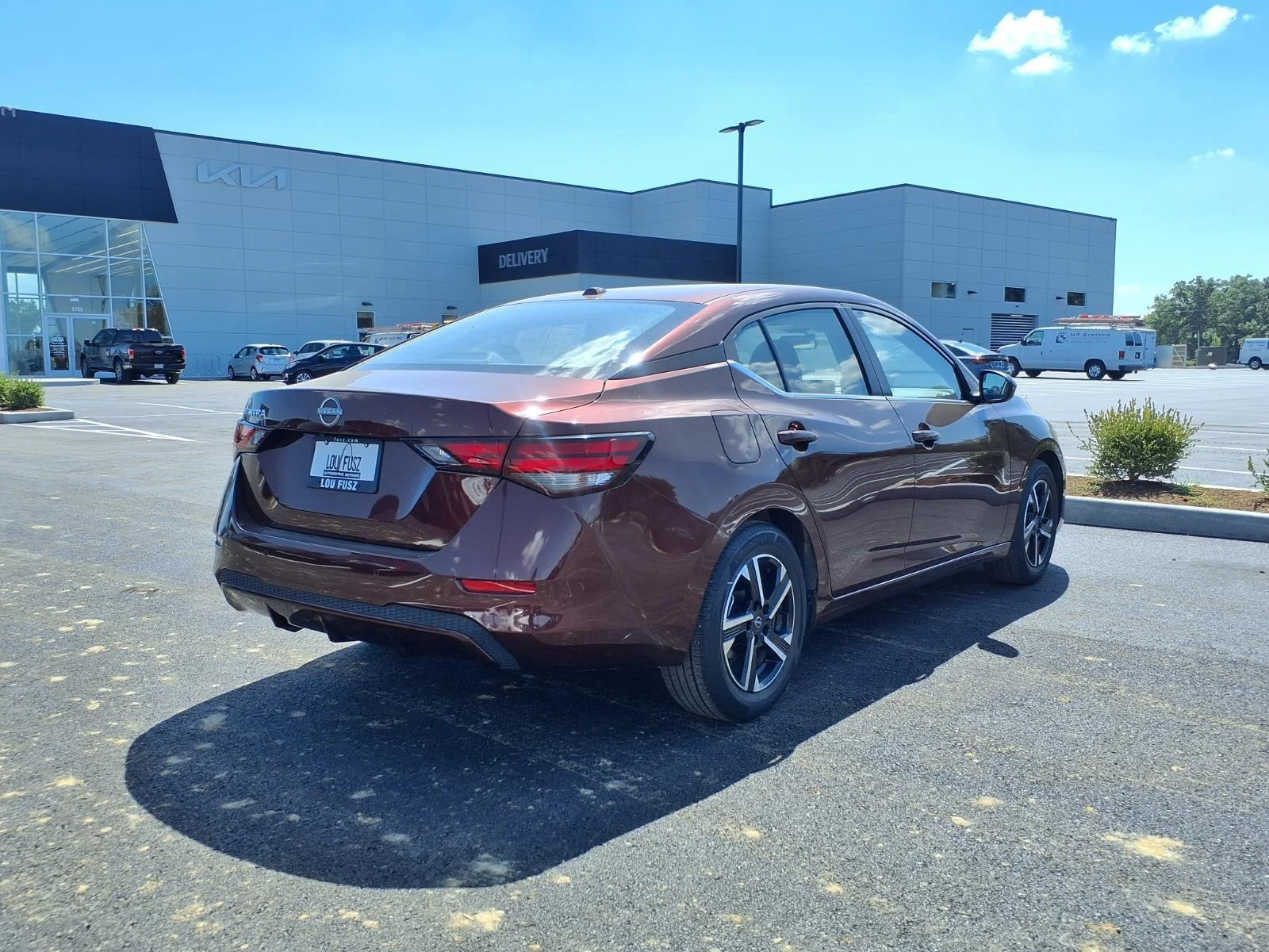 Used 2025 Rosewood Metallic Nissan SV image 24