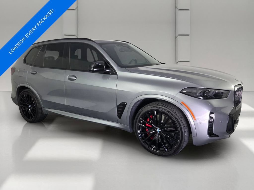 Certified Used 2024 Skyscraper Grey Metallic BMW M60i image 2