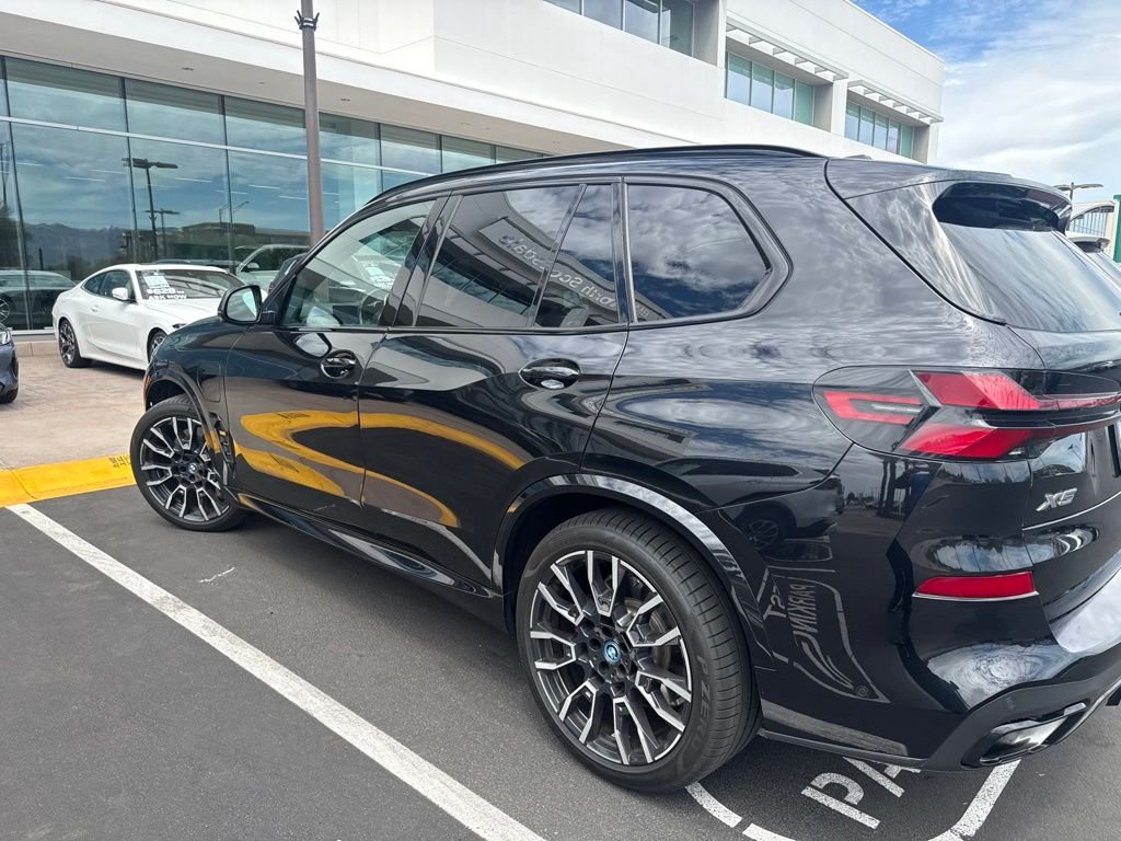 Certified Used 2024 Black Sapphire Metallic BMW xDrive50e image 4