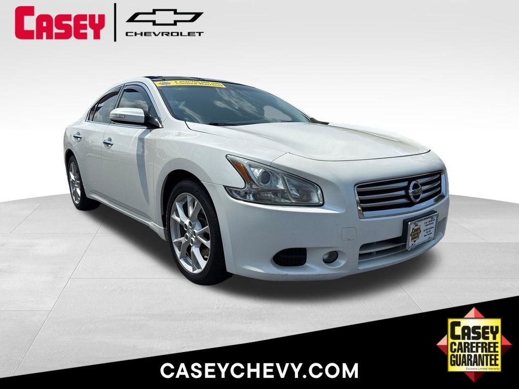 Used 2013 Pearl White Nissan 3.5 SV image 1