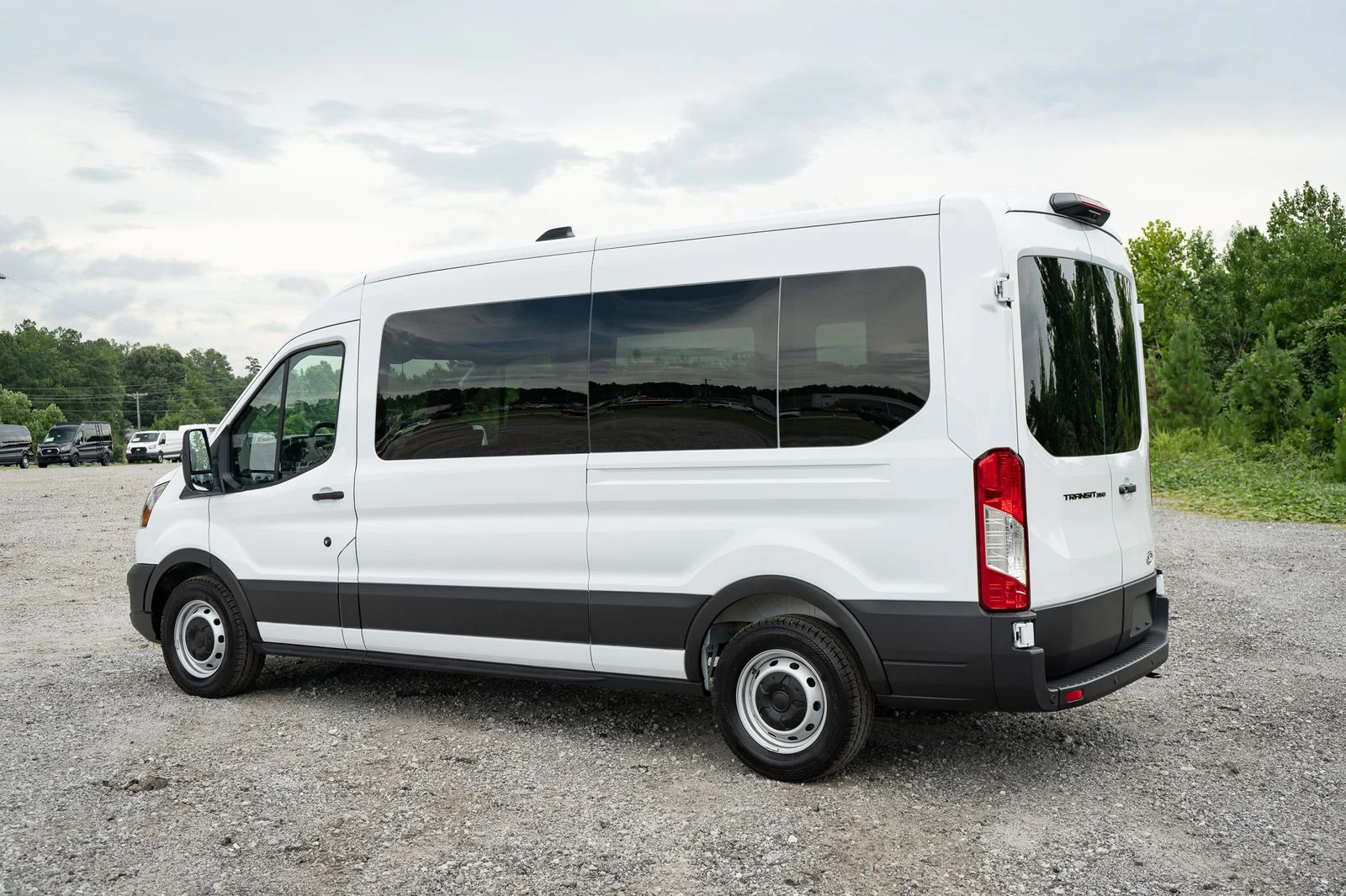 New 2026 Oxford White Ford Passenger Van XL image 7