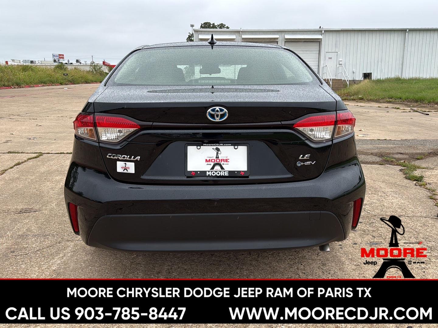 Used 2025 Midnight Black Metallic Toyota Hybrid LE image 6