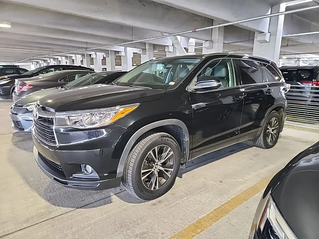 Used 2016 Midnight Black Metallic Toyota XLE image 1