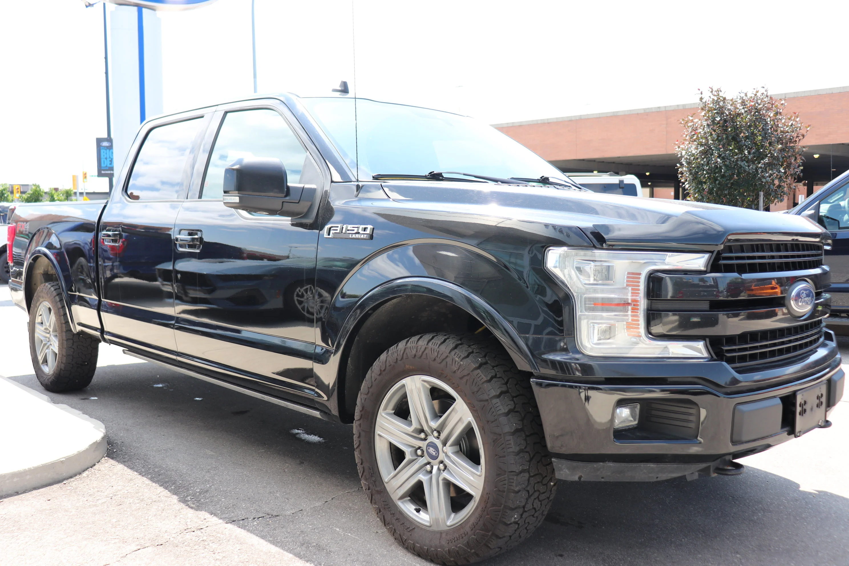 Certified Used 2019 Black Ford Lariat 4WD SuperCrew 5.5