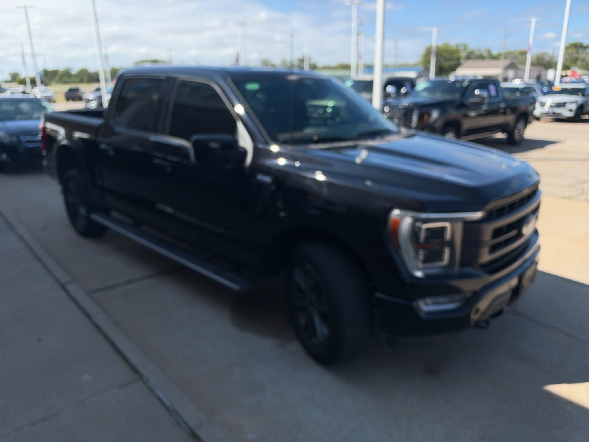 Used 2023 Agate Black Metallic Ford LARIAT image 4
