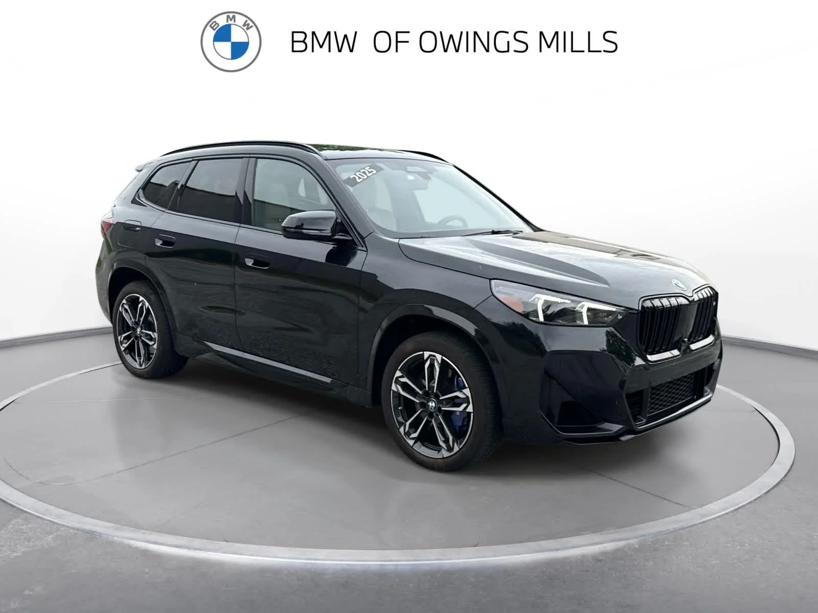 Used 2025 Black Sapphire Metallic BMW M35i image 10