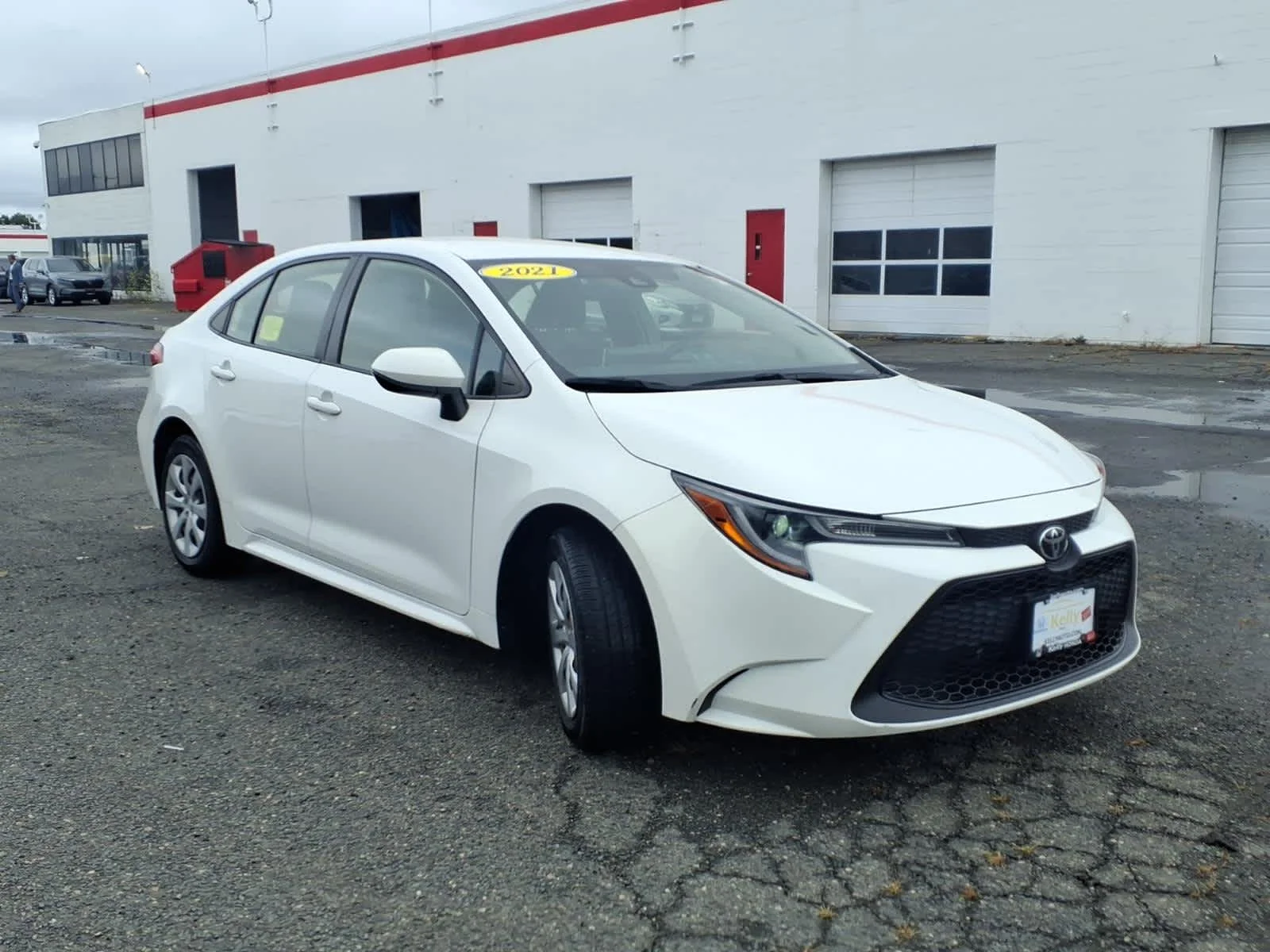 Used 2021 Super White Toyota LE image 3