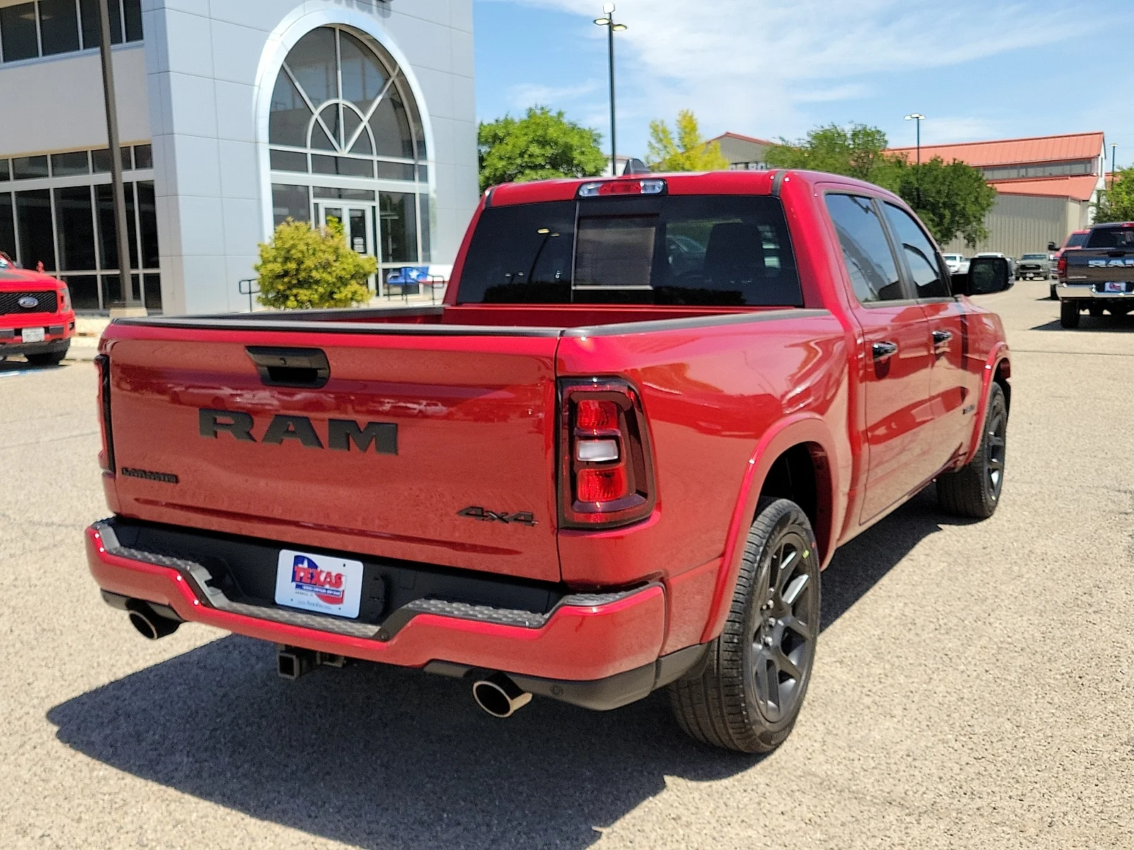 New 2026 PR6 Molten Red Ram LARAMIE CREW CAB 4X4 5
