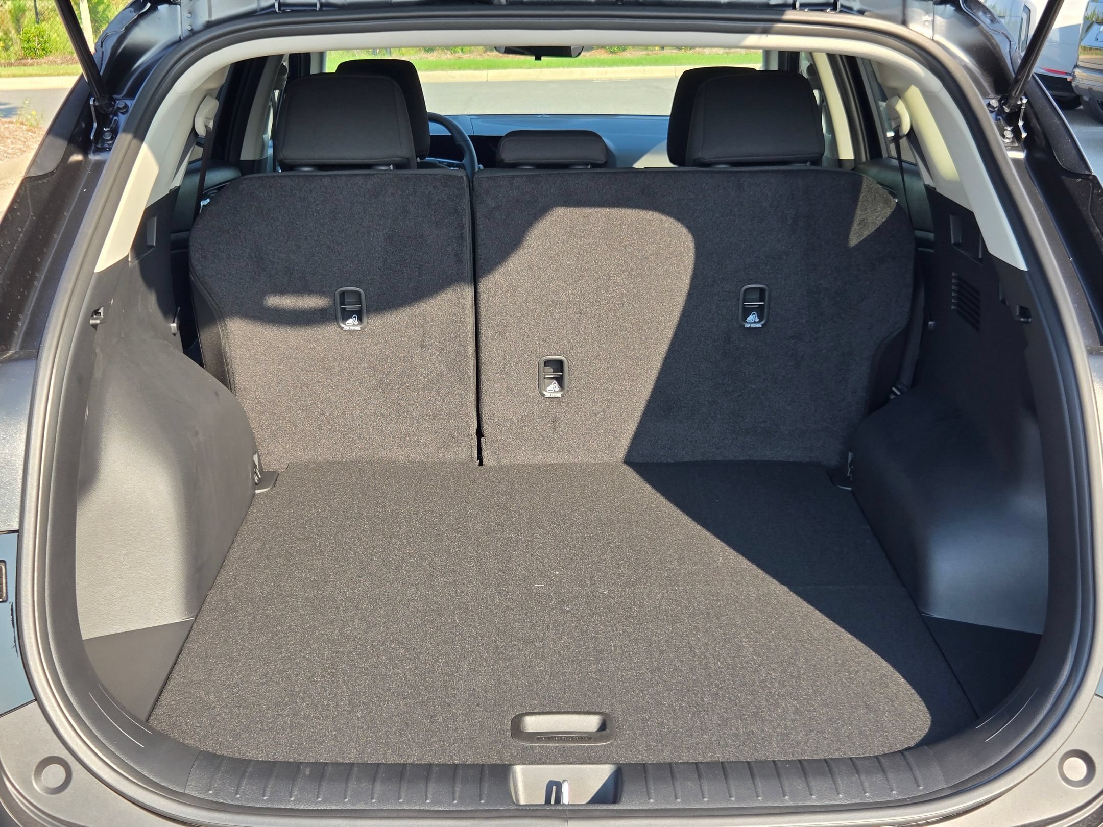 New 2026 Ebony Black Kia LX image 14