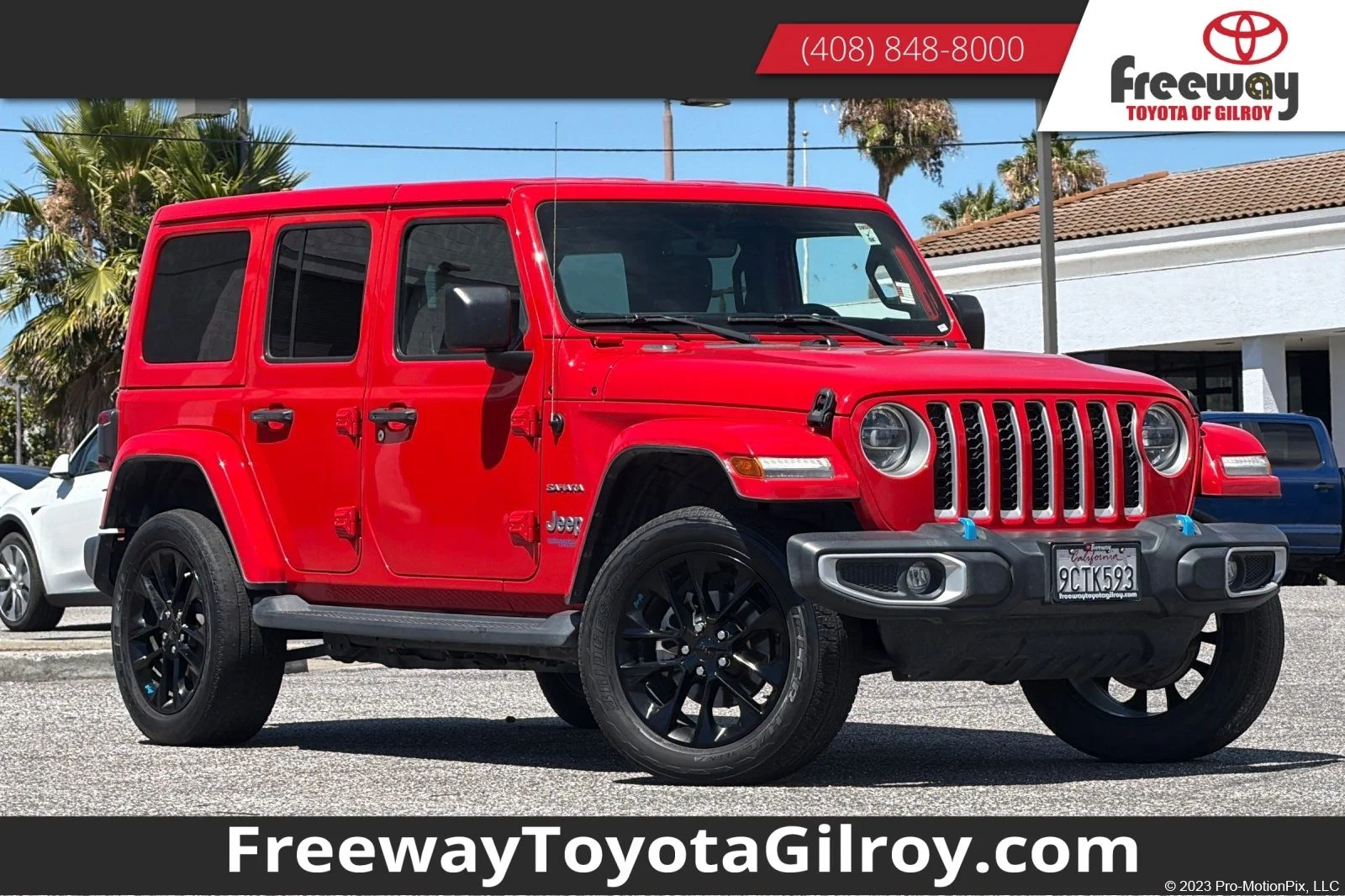 Used 2022 Red Jeep Unlimited Sahara 4xe image 1