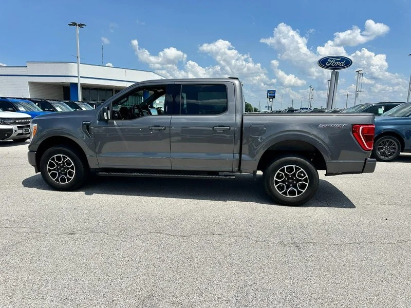 Used 2021 Carbonized Gray Metallic Ford XLT 4WD SuperCrew 5.5
