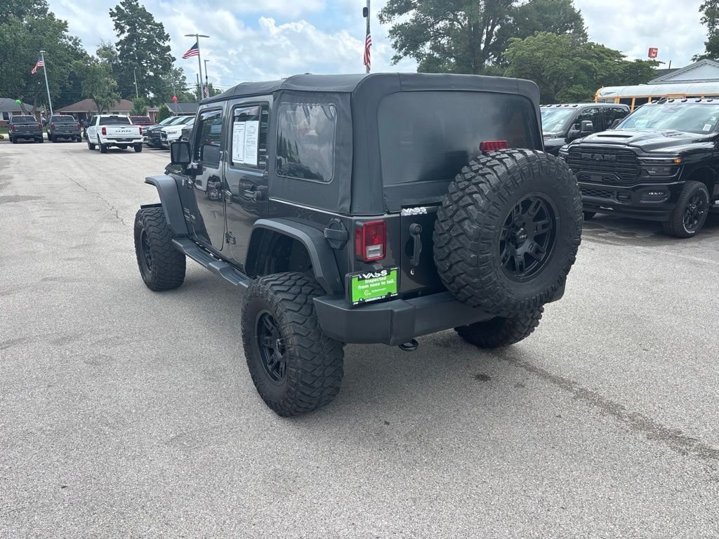 Used 2017 Gray Jeep Unlimited Sport image 3